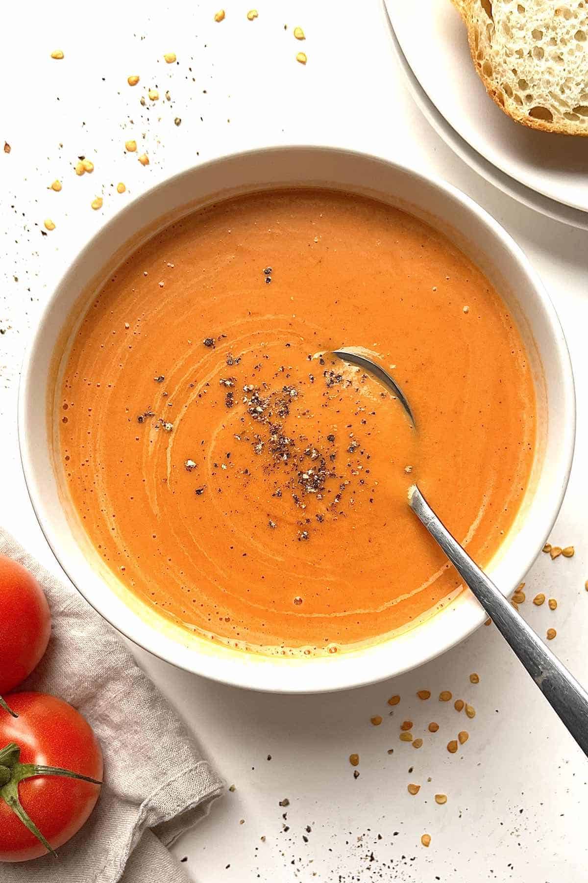 Easy blender tomato soup in a white bowl.