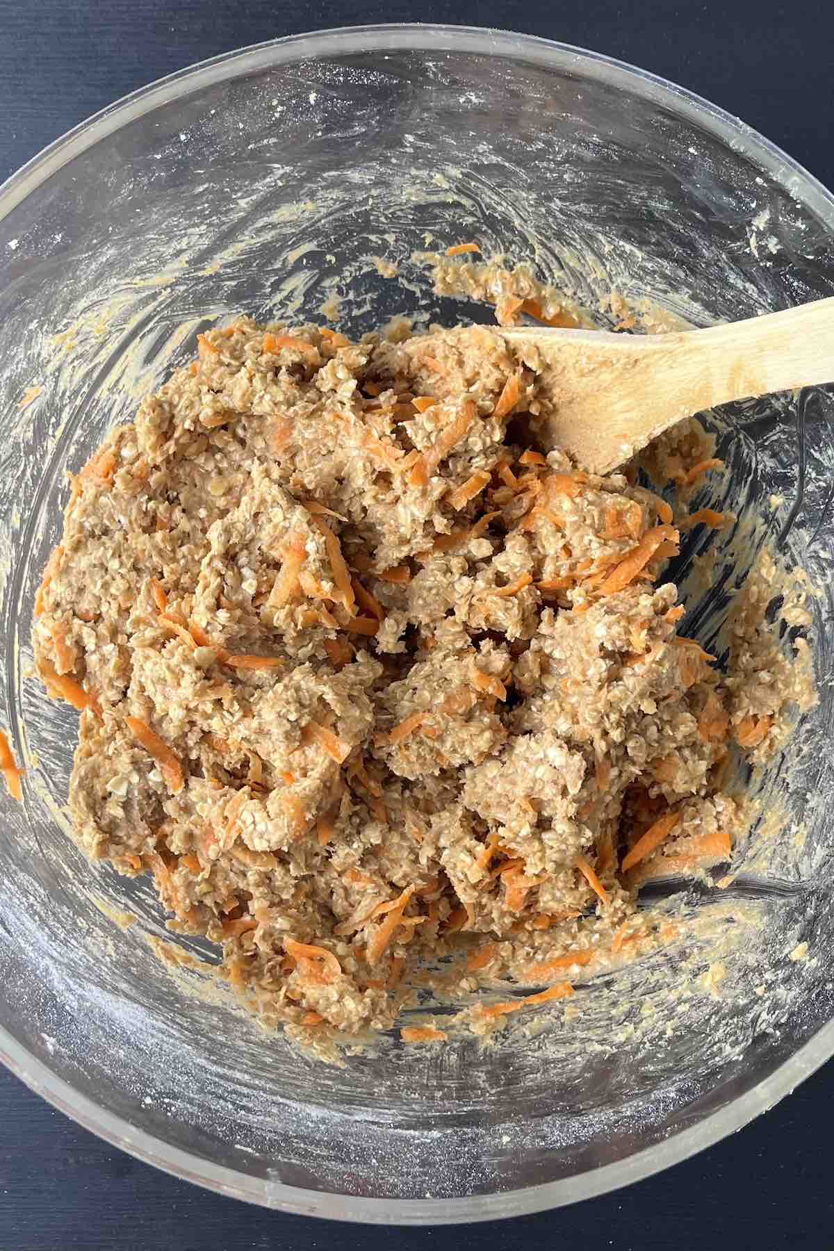 Shredded carrots and oatmeal mixed in with the cookie dough batter.
