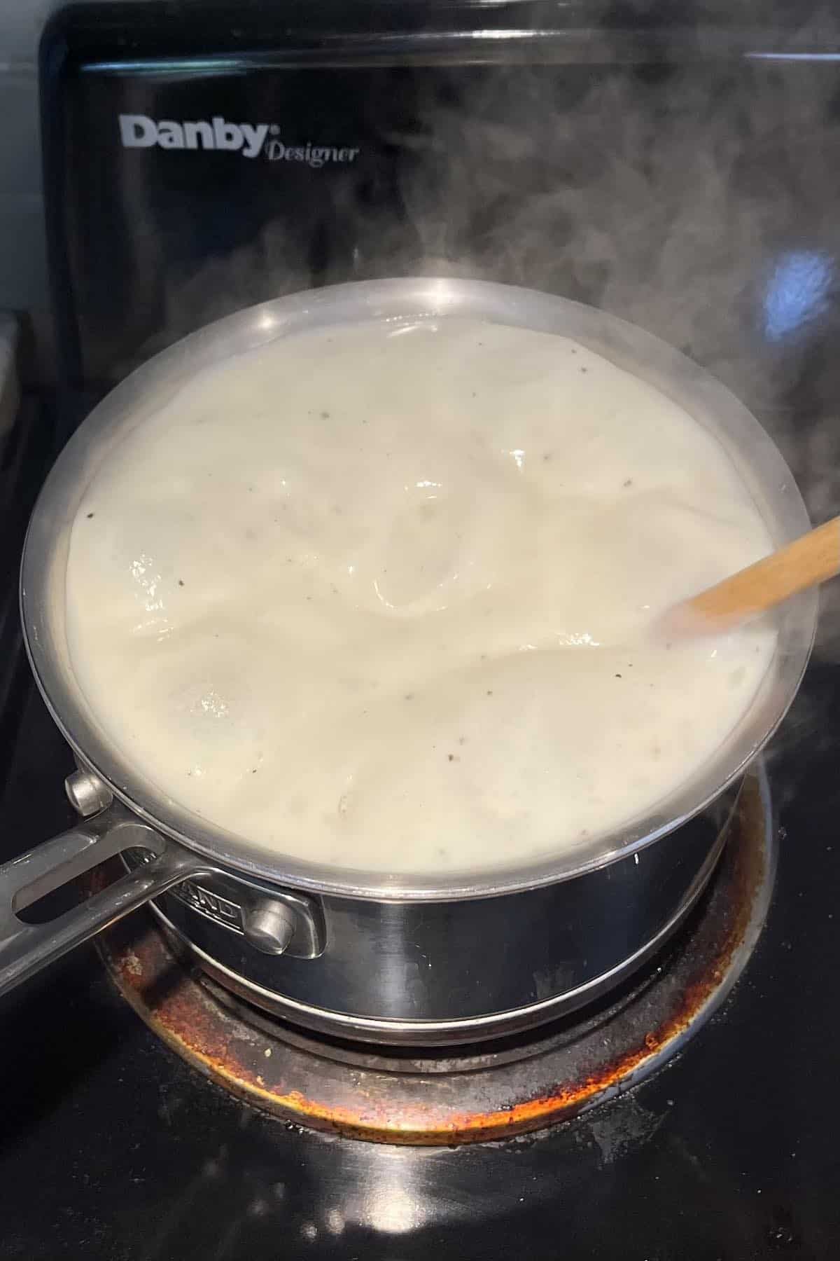 Roux boiling in a pot.