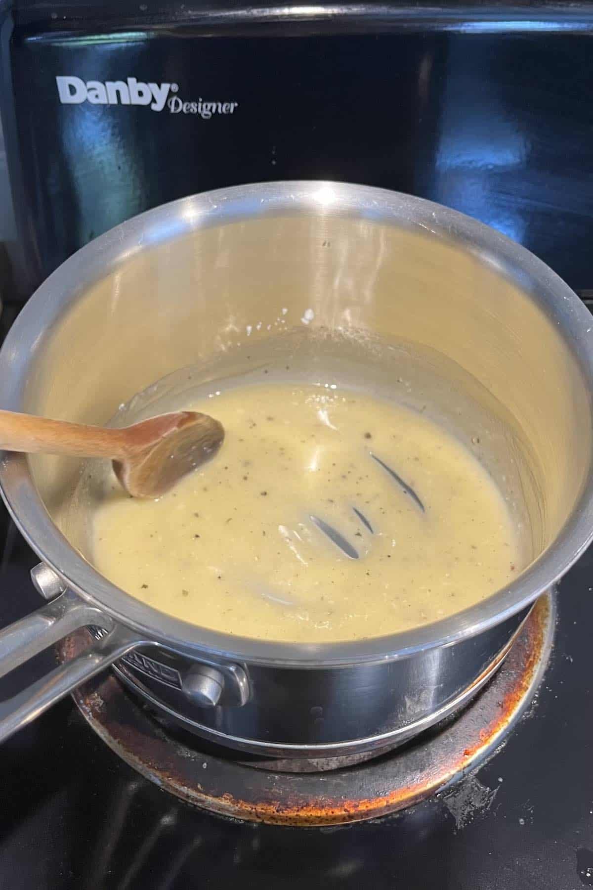 Roux ingredients in pot.
