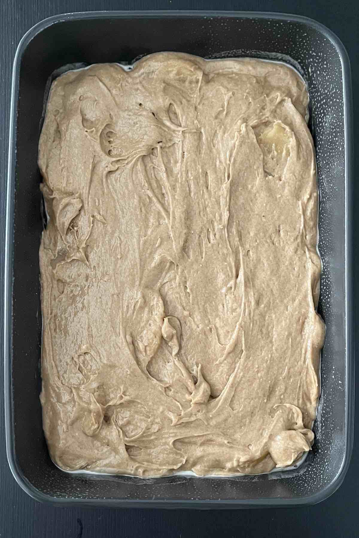 Cake batter in a baking dish.