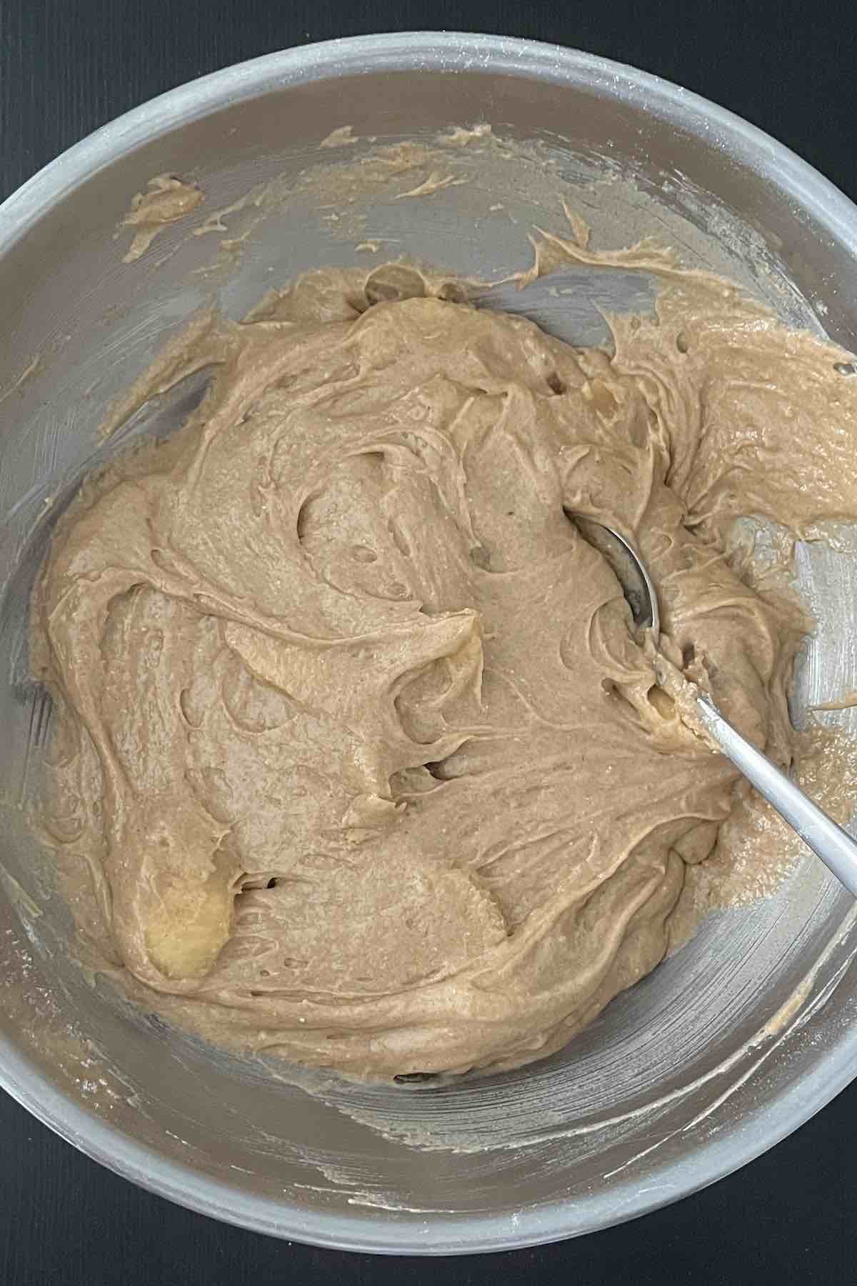 Canned apple pie filling and spice cake mixed with the eggs.