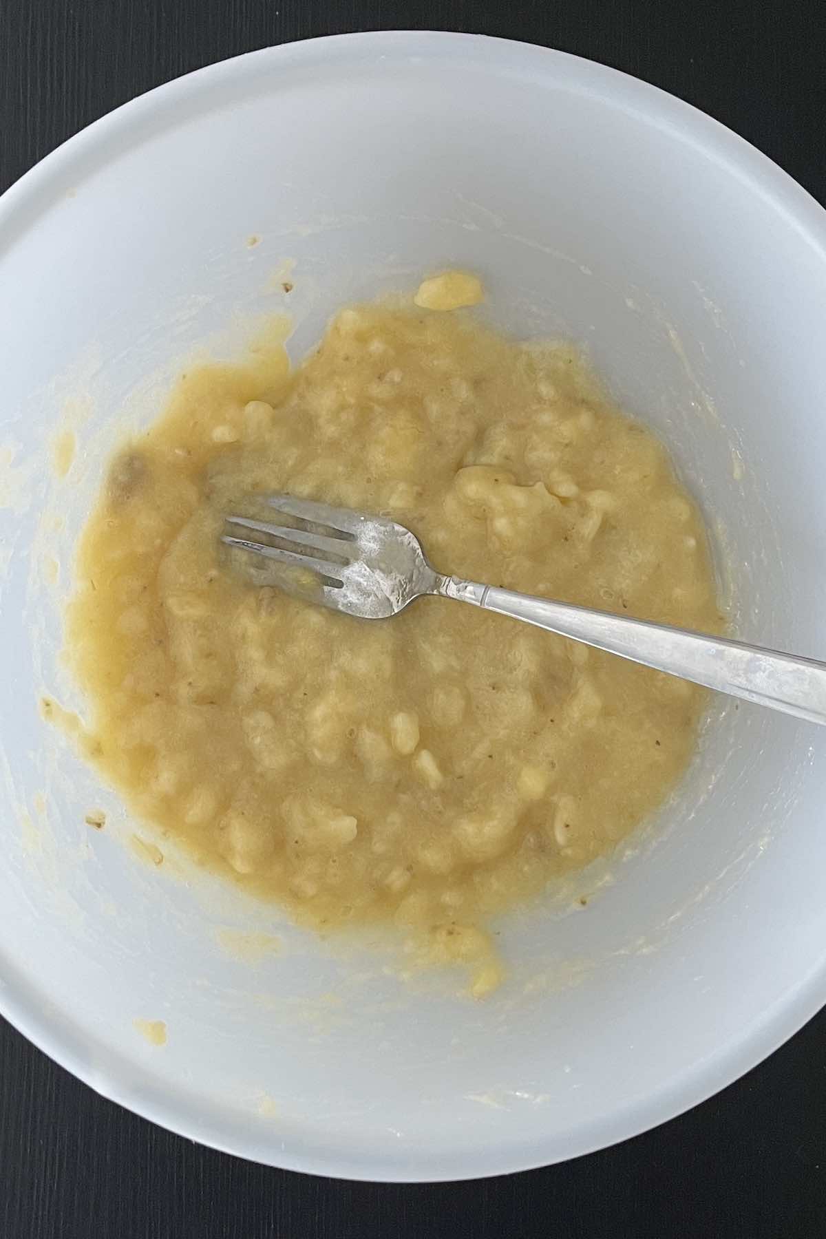 Mashed bananas in a bowl.