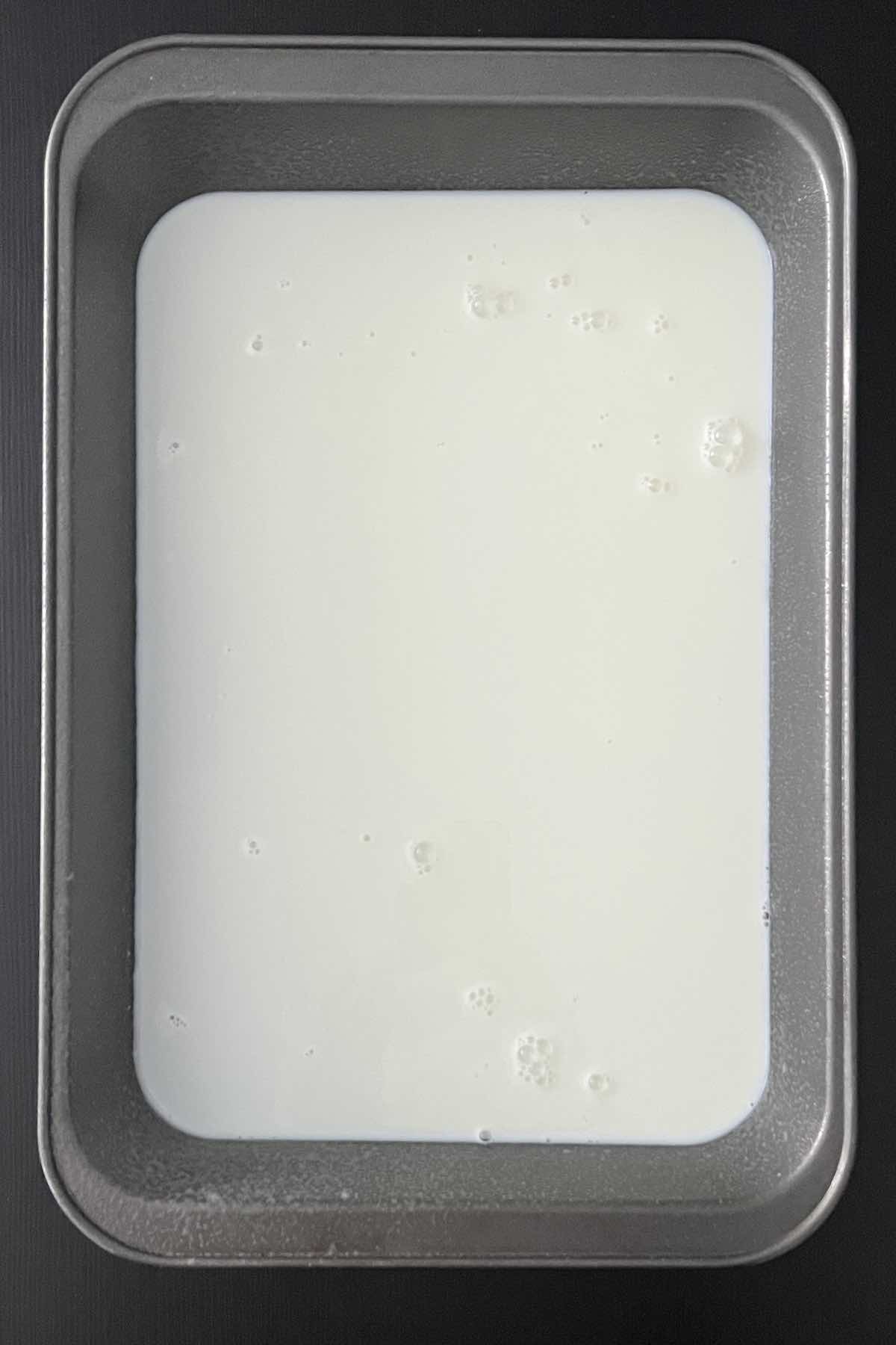 Milk in baking dish.