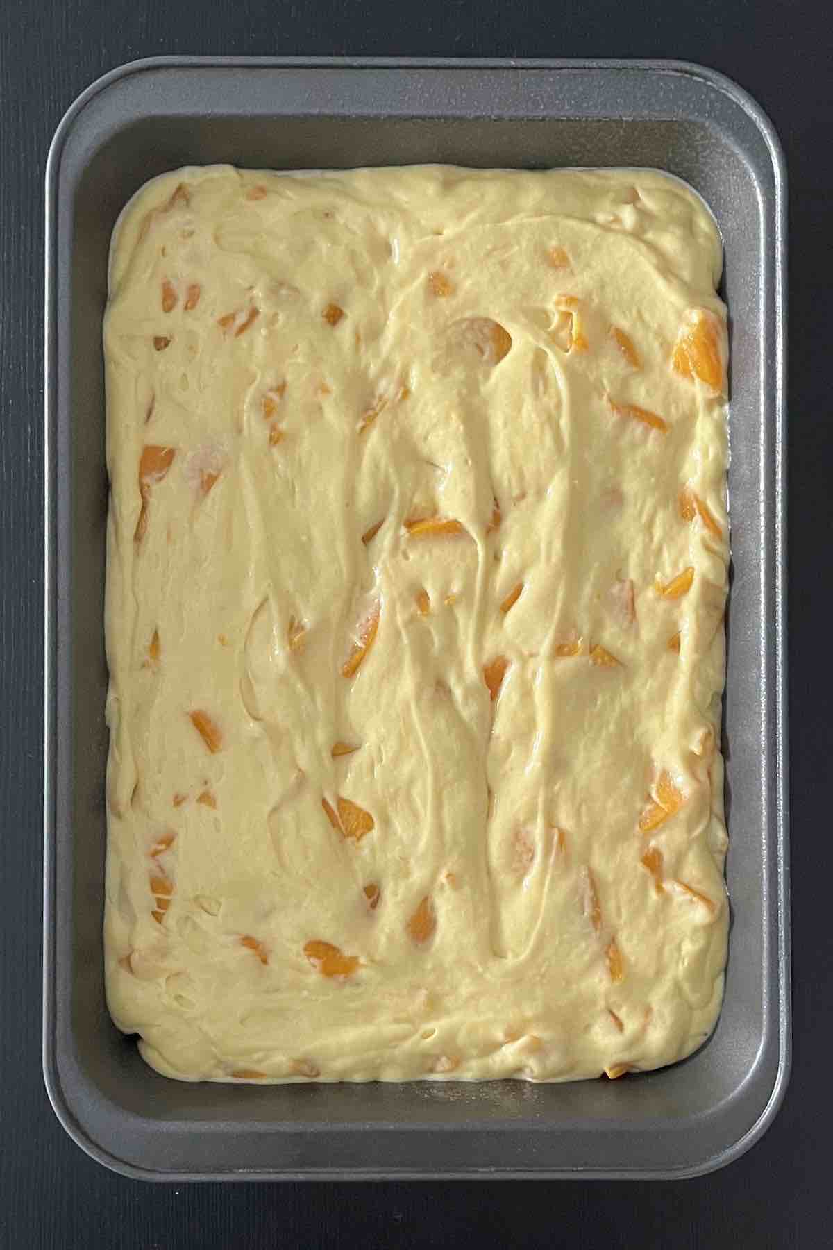 Cake batter in baking dish.