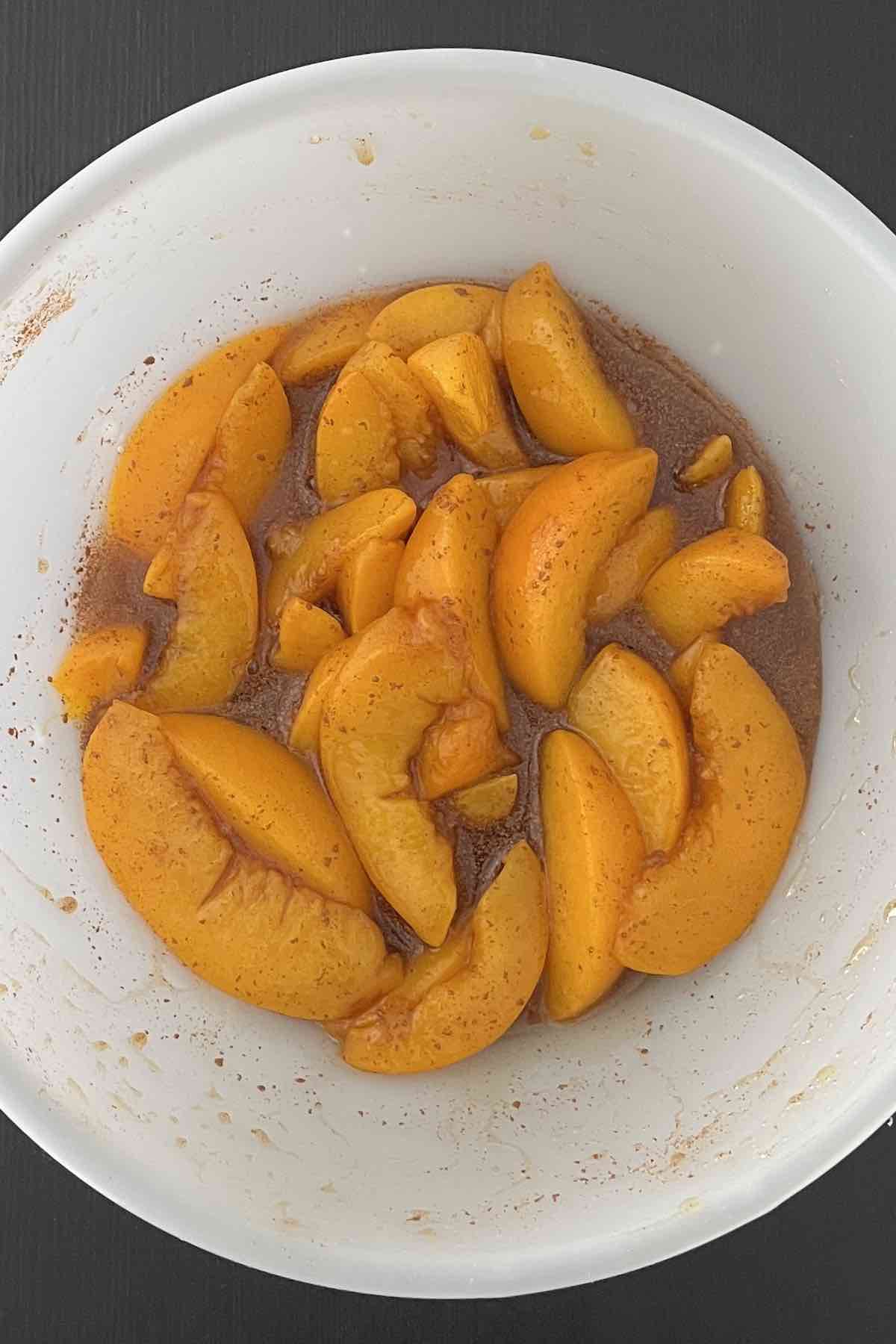 Peach tart filling mixed in a bowl.