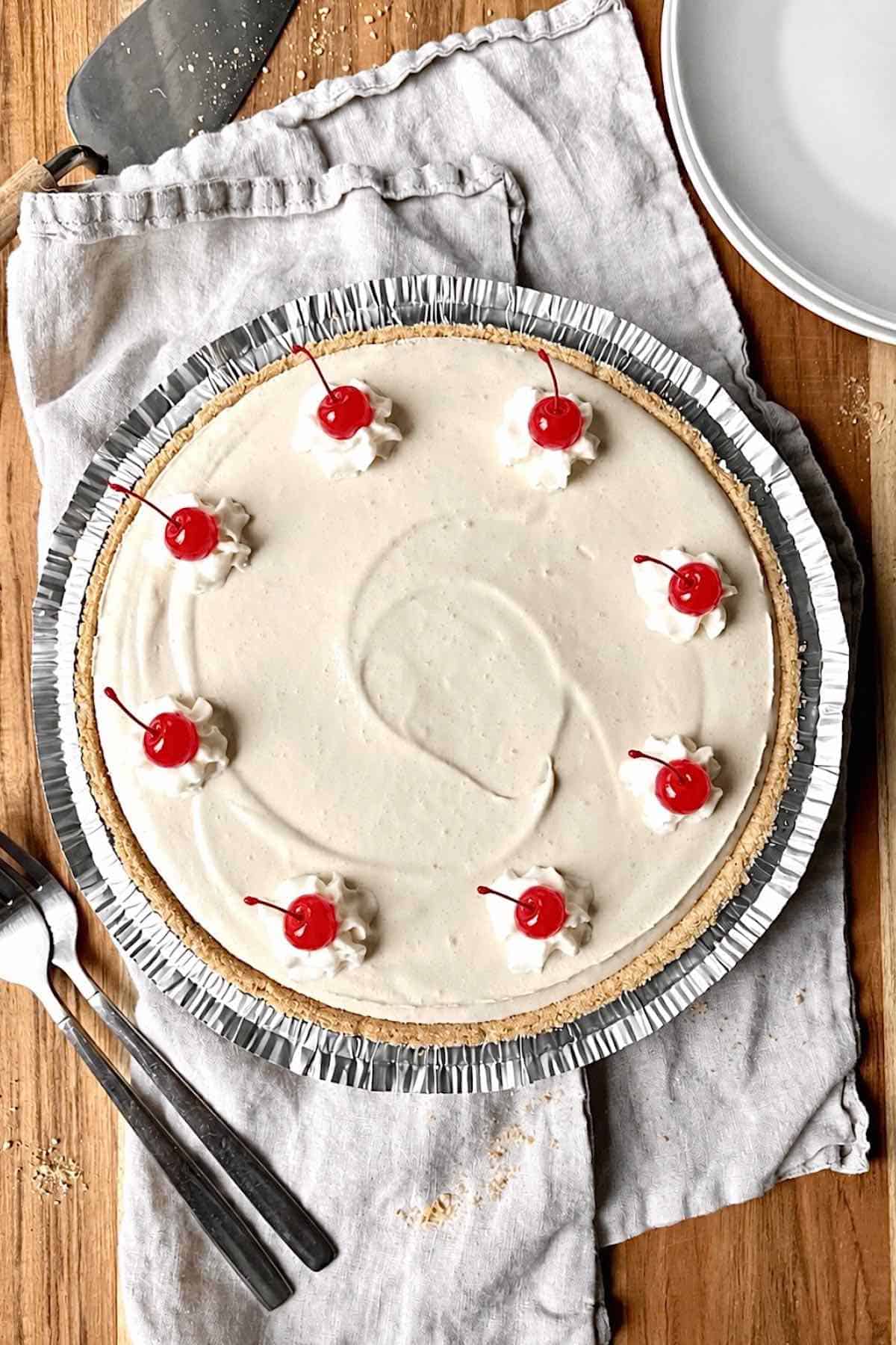 Root beer float pie on a wooden table.
