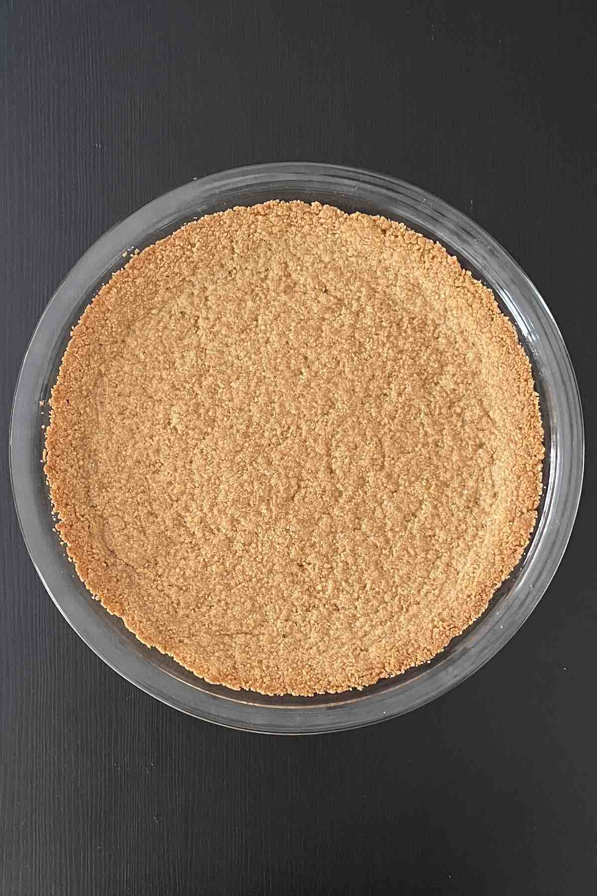 Baked graham cracker pie crust.