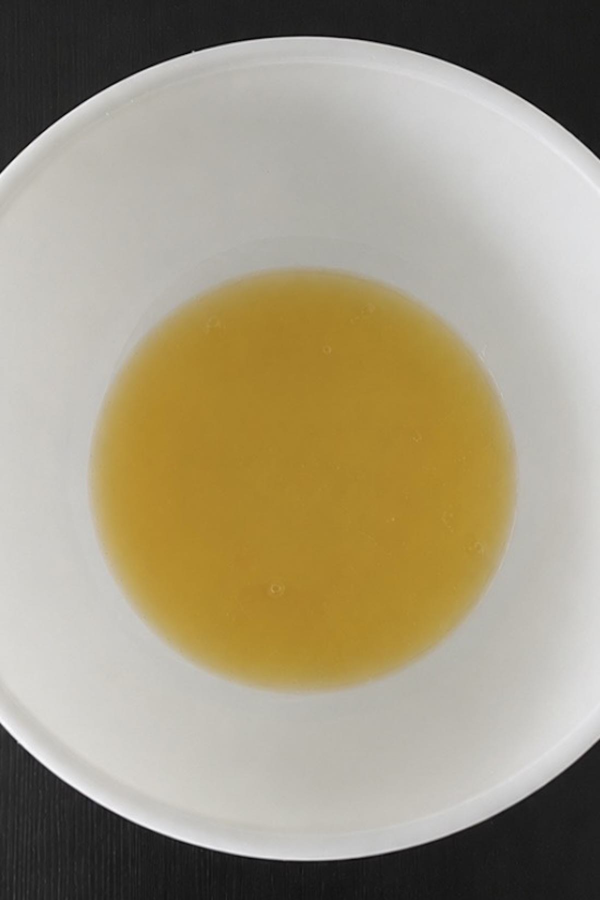 Melted butter in a bowl.
