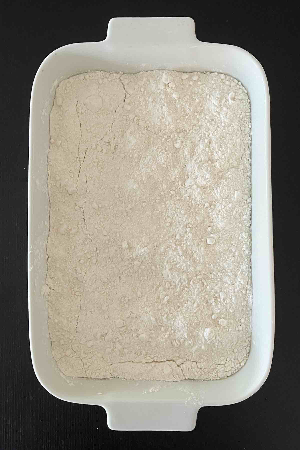 Cake mix in a baking dish.