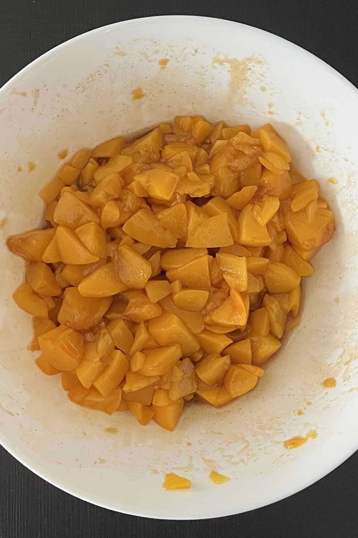 Diced peaches tossed with brown sugar and cinnamon.